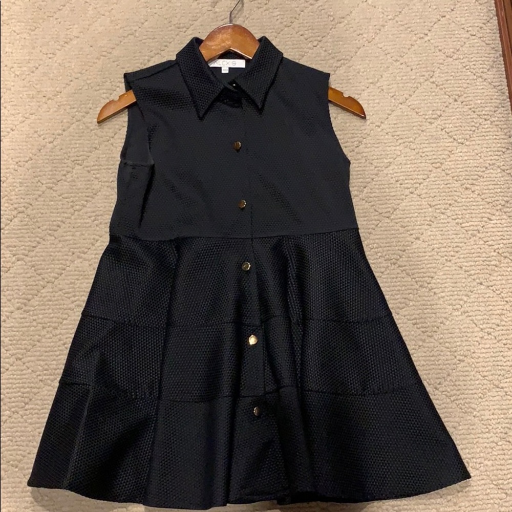 Alexis XS black collared blouse w/ gold buttons.